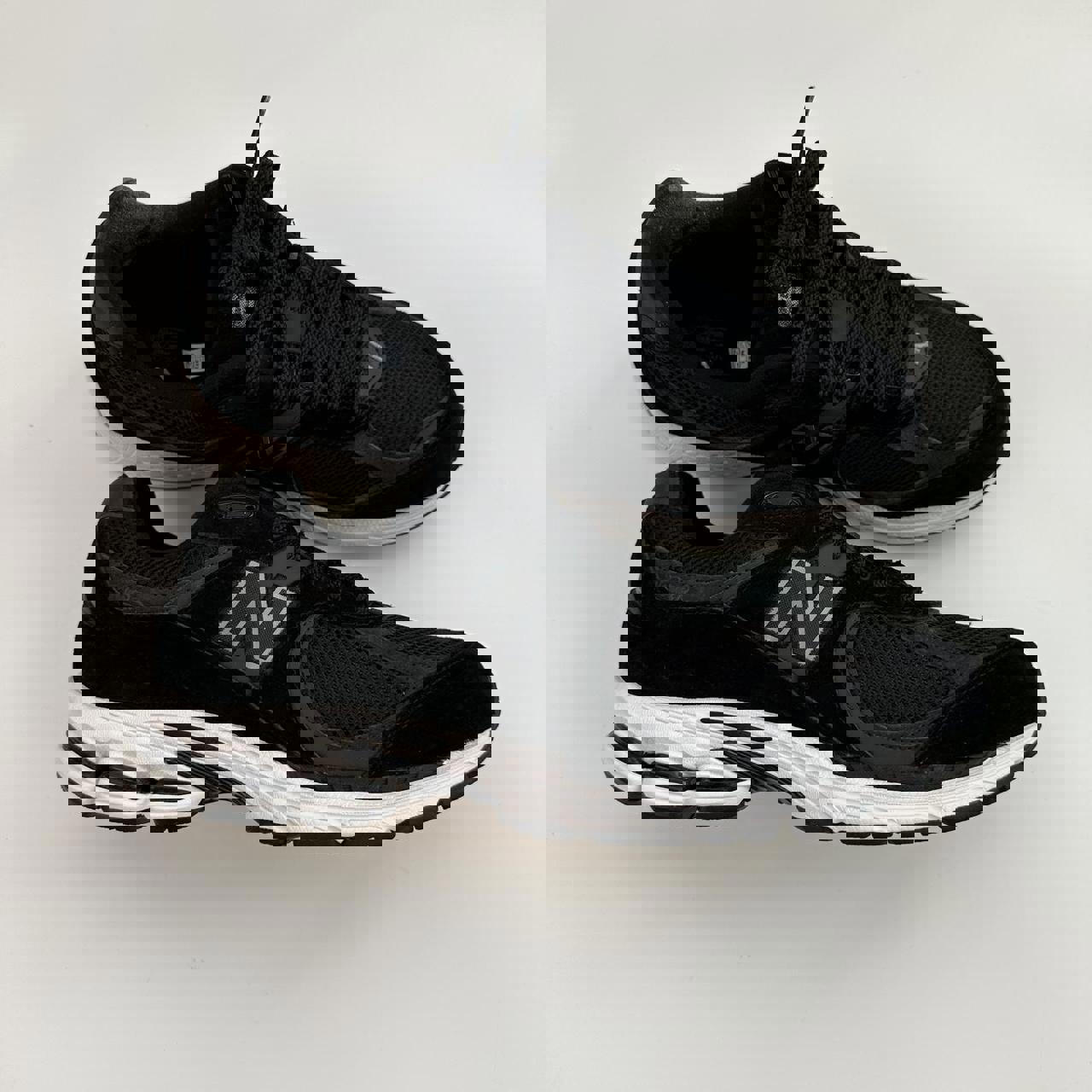 New Balance 2002R black gunmetal sneakers.