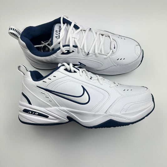 Nike Air Monarch sneakers in blue and white.