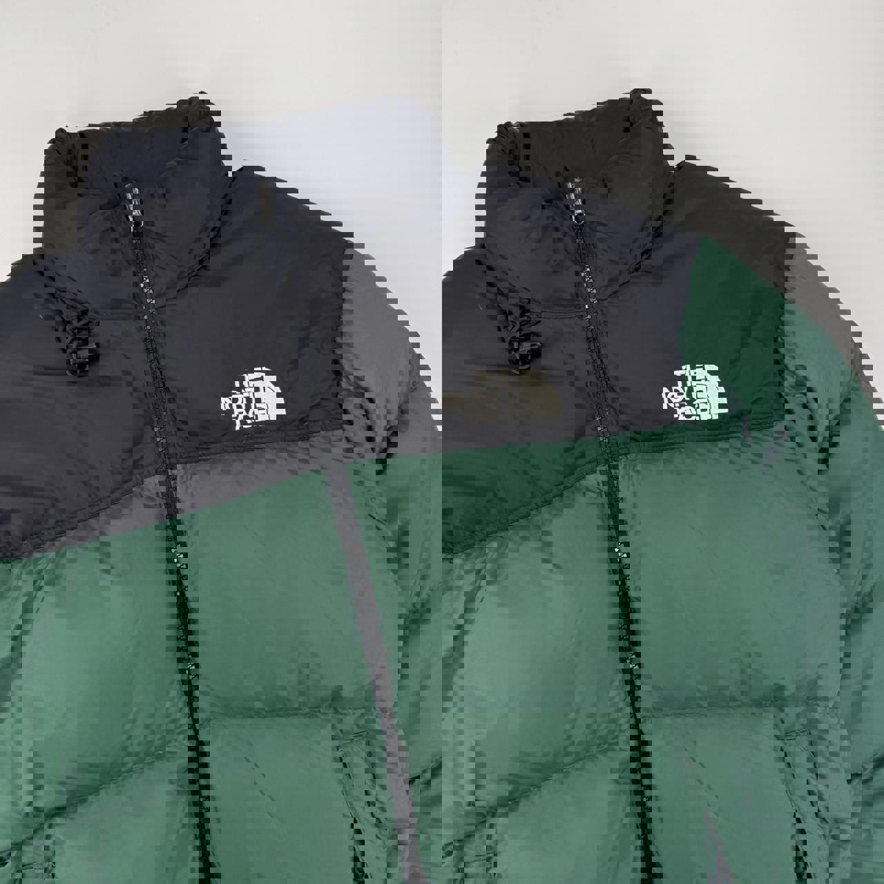 The North Face TNF 1996 Nuptse Puffer Jacket in forest green and black.
