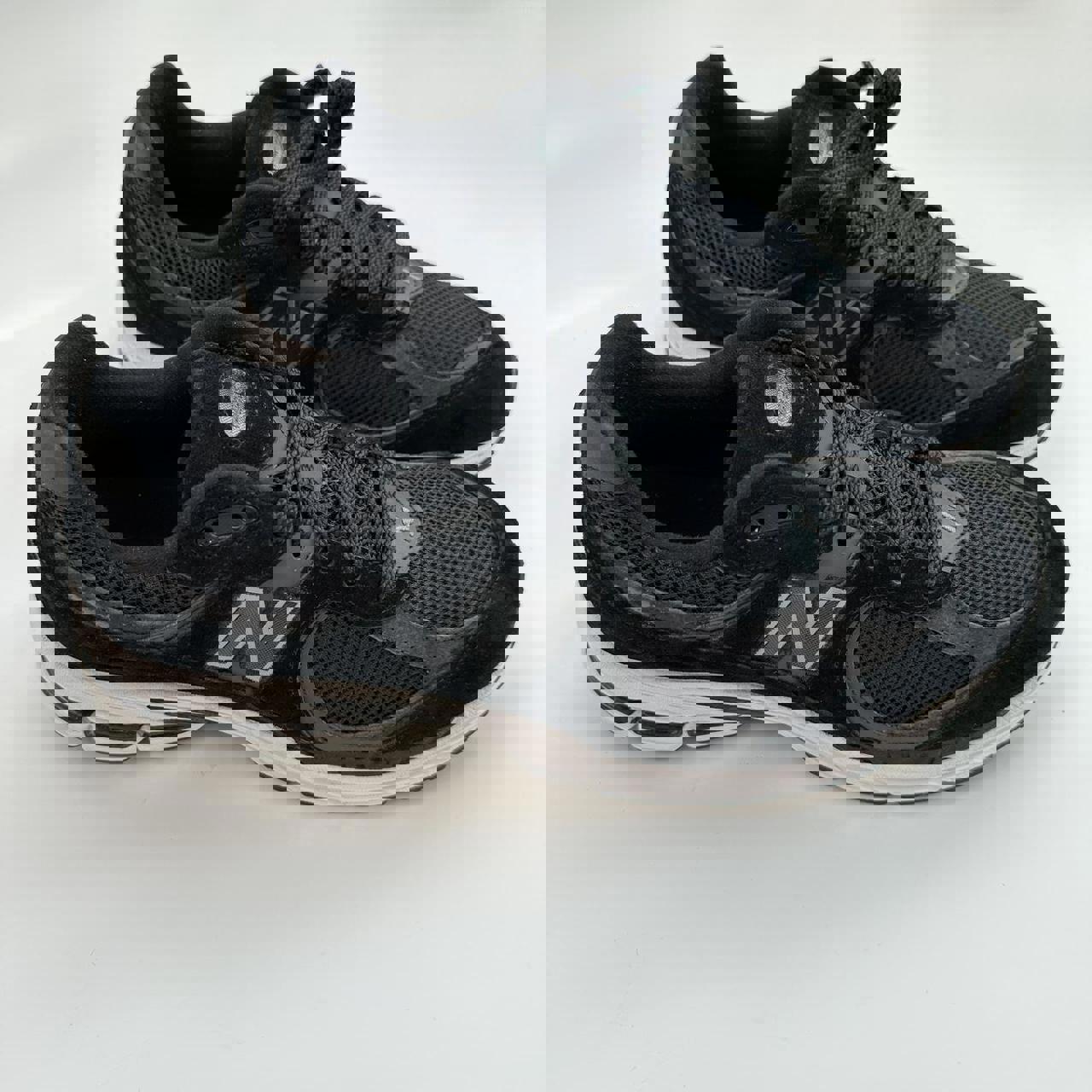 New Balance 2002R black gunmetal sneakers.