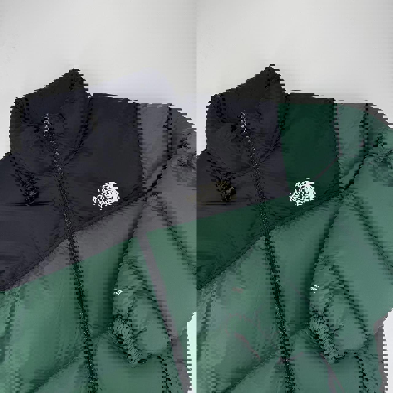 The North Face TNF 1996 Nuptse Puffer Jacket in forest green and black.