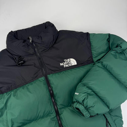 The North Face TNF 1996 Nuptse Puffer Jacket in forest green and black.