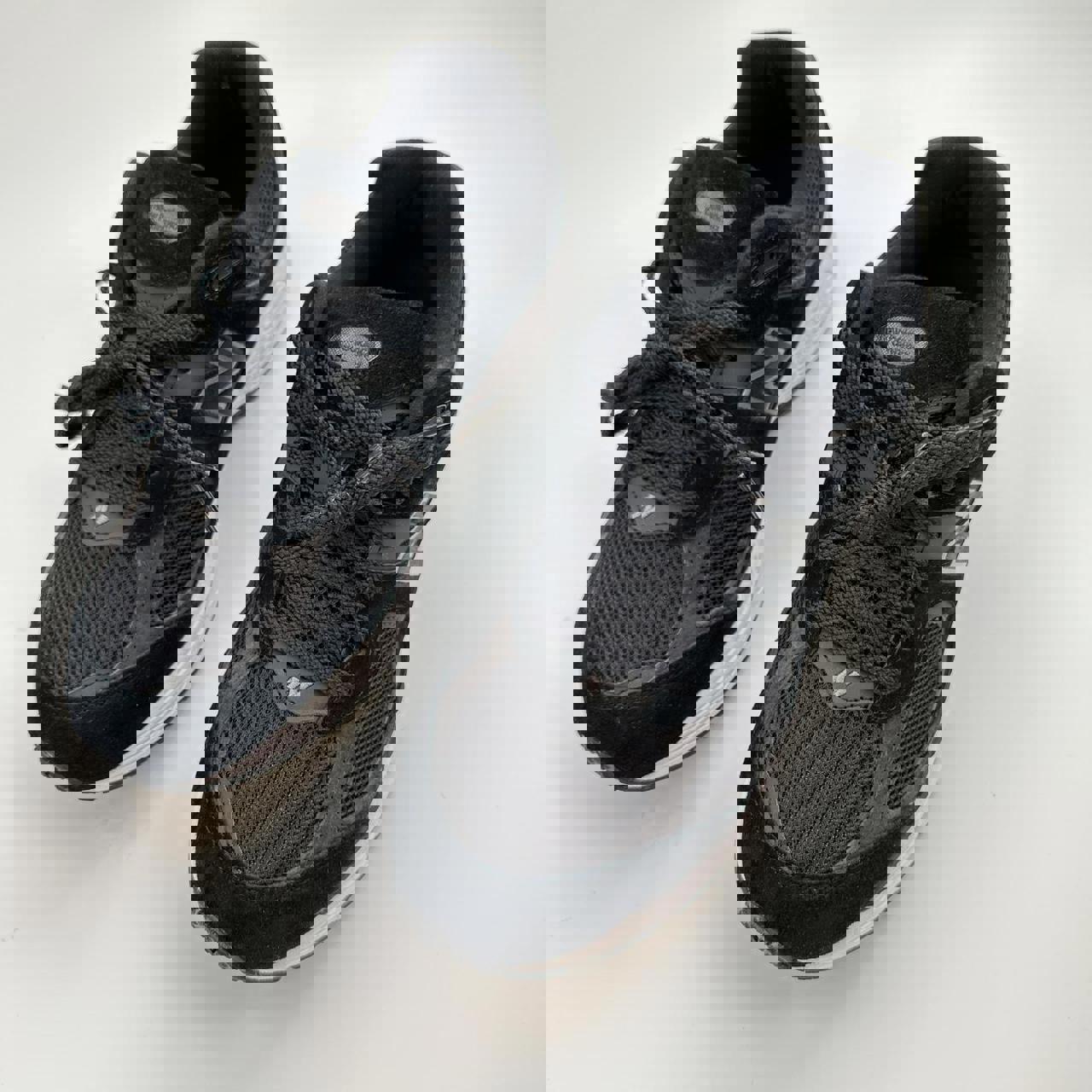 New Balance 2002R black gunmetal sneakers.
