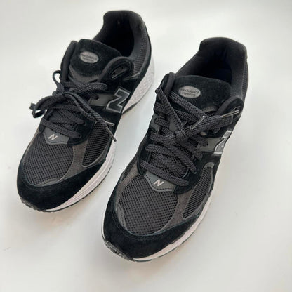 New Balance 2002R black gunmetal sneakers.