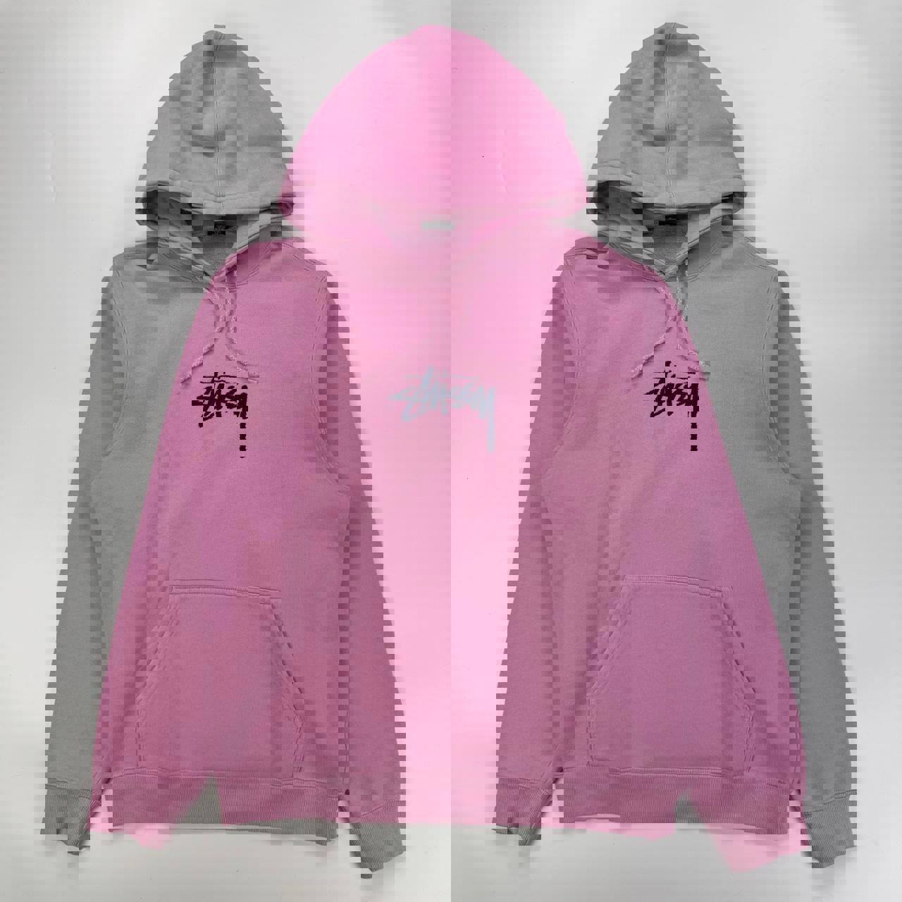 Stussy hoodie in pink with navy blue embroidered logo.