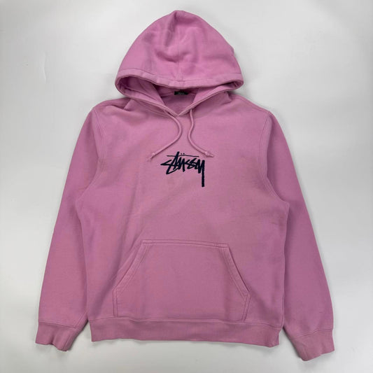 Stussy hoodie in pink with navy blue embroidered logo.