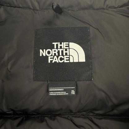 The North Face TNF 1996 Nuptse Puffer Jacket in forest green and black.