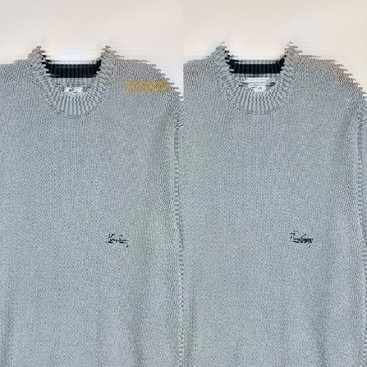 Vintage Burberry knitted jumper in baby blue with navy embroidered logo.