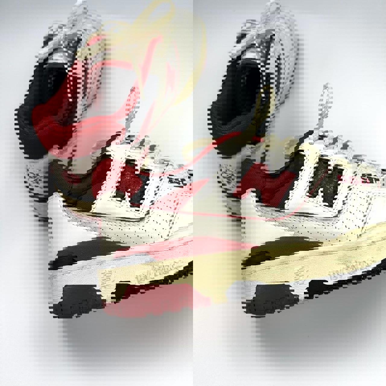 New Balance 550 x Aime Leon Dore in red and white colourway.